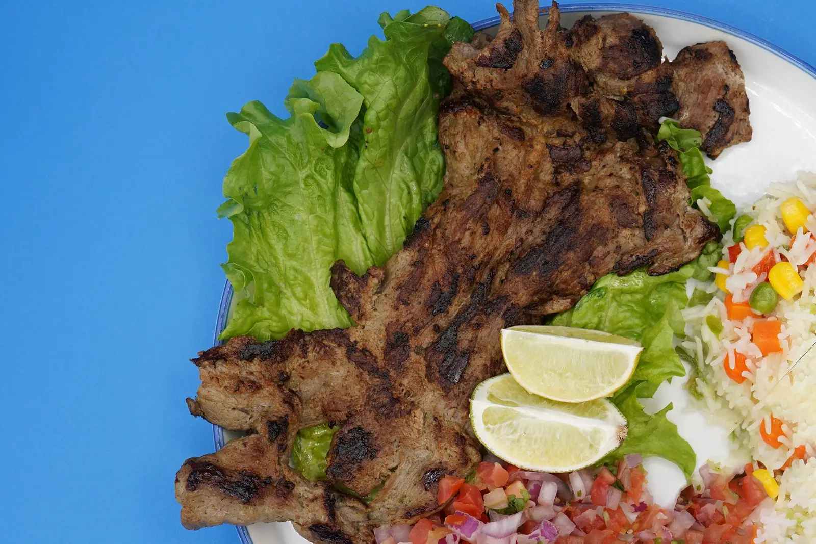 Fajitas a la plancha con arroz y pico de gallo combo salvadoreño en Houston TX